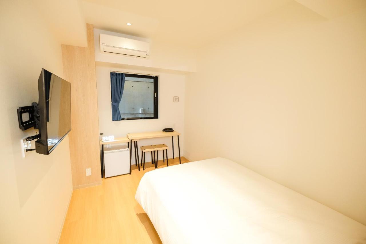 Ele Hotel Kuzuha Hirakata Esterno foto